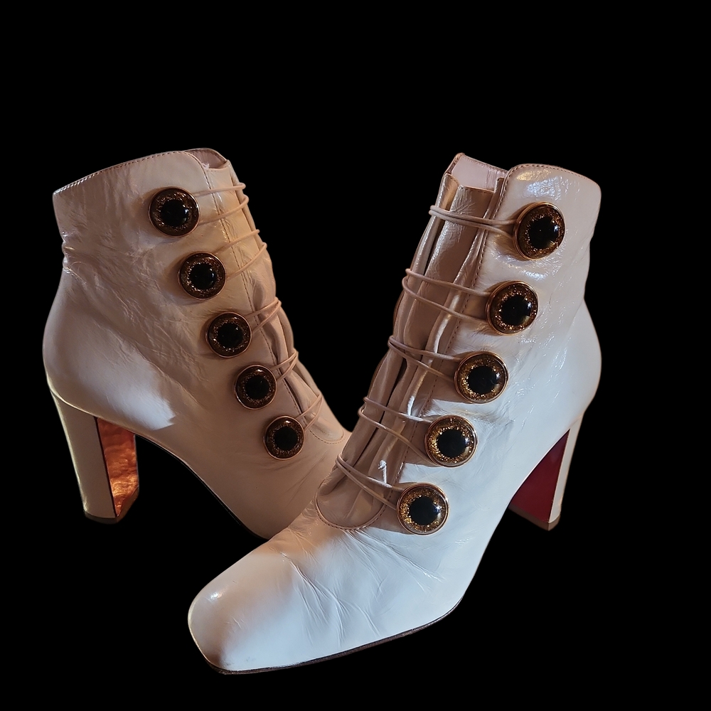 Christian Louboutin Ivory Heeled Boots with Black and Gold Accents